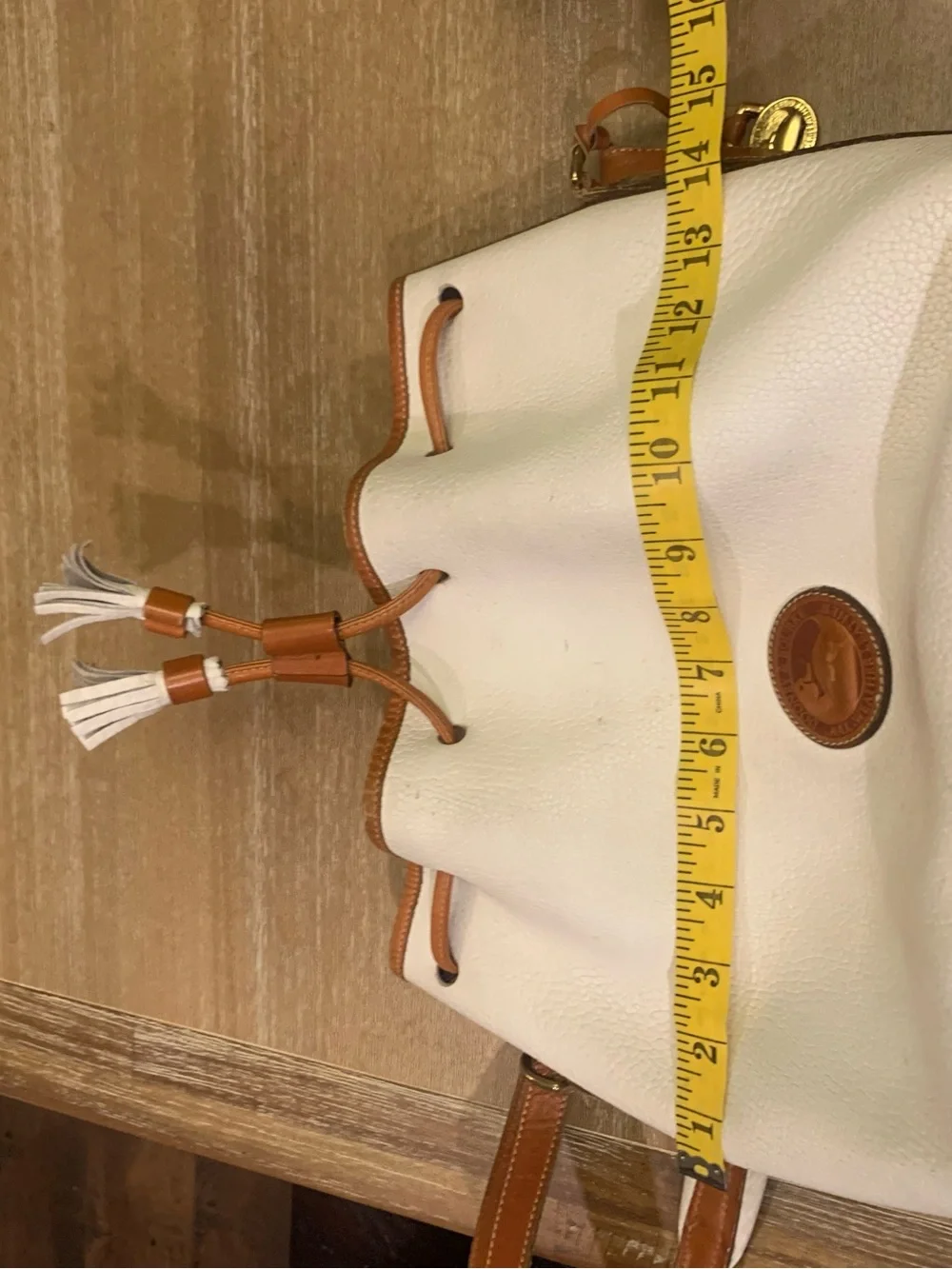 Vintage Dooney & Burke White and Brown Drawstring Bucket Bag with Tassel Accent - Picture 4 of 15